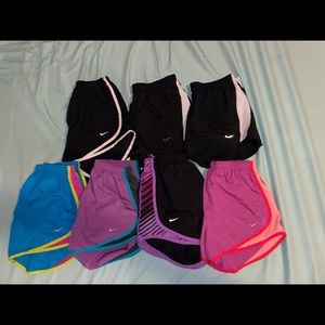 7 Pairs of Nike running shorts all in good shape